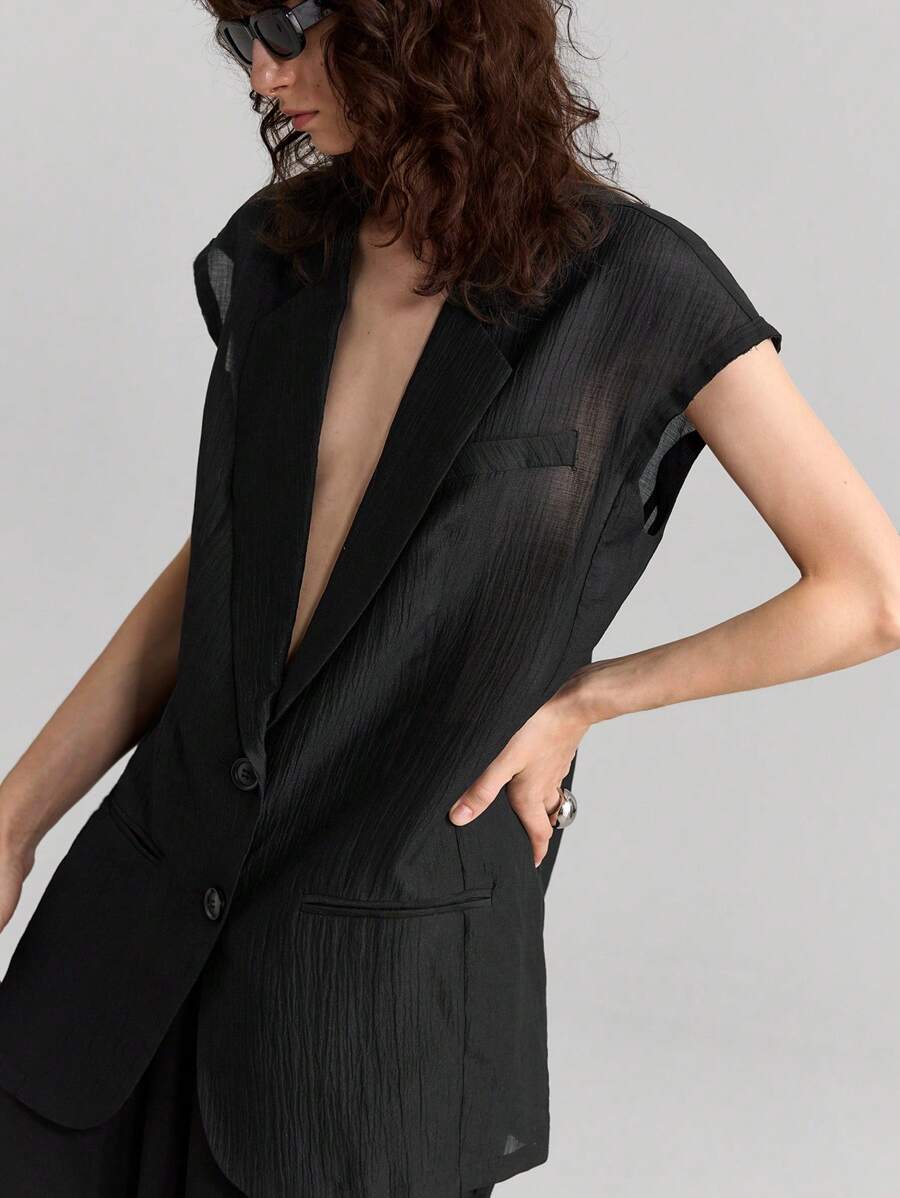 Ontre Women's Casual Black Blazer: Thigh-Length Cap Sleeve Woven Fabric Jacket With Lapel Neckline And Pockets, Semi-Sheer And Perfect For Summer - Black - View 1