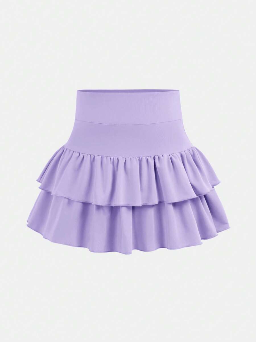 SHEIN Niña preadolescente Falda mini de unicolor de punto con volantes y shorts incorporados, Moda Y2K, Chica elegante, Vuelta al colegio - Púrpura malva - Ver 1
