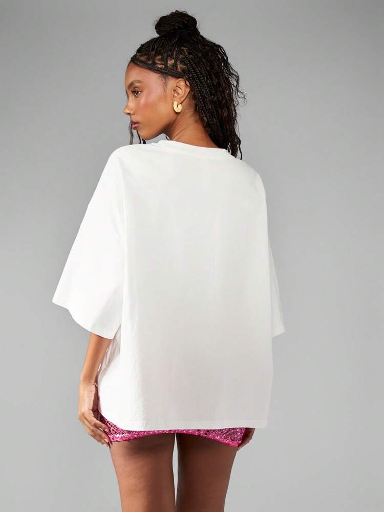 MISSGUIDED Maglietta oversize con grafica floreale, casual in cotone, adatta per primavera/estate, festival, loungewear, design orchidea rosa, stile boho e streetwear