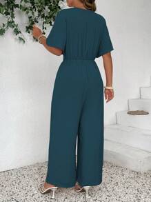 Celure Macacão plus size de cor sólida, casual, vintage, com decote em V e amarração frontal