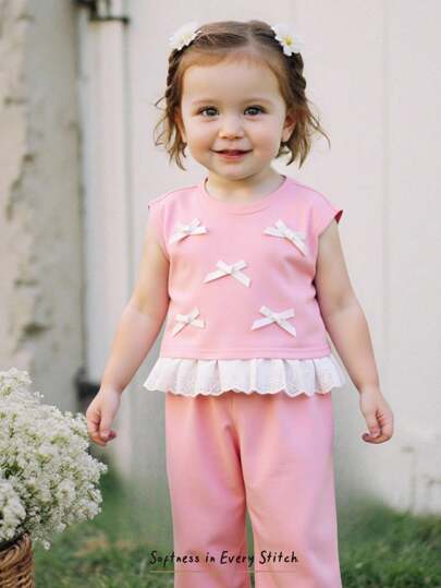 Cozy Pixies Set de 2 piezas para niñas bebés con blusa de manga corta con cuello de volantes decorada con lazo 3D y pantalones de cintura elástica de unicolor