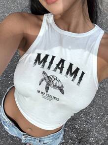 SHEIN EZwear 白色无袖上衣，饰有休闲迈阿密海龟图案，适合夏季、度假、海滩穿着，34% 棉。迈阿密图案背心，白色图案露脐上衣，夏季上衣，女士度假迈阿密背心，女士夏季背心，白色露脐上衣，夏季度假上衣，海龟图案T恤，女士夏季上衣，返校季上衣 - 白色 - 查看 3