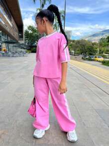 Conjunto informal de niña preadolescente para uso diario escolar, conjunto de Top suelta de cuello redondo con ribete de cinta a contraste y pantalón de chándal a juego, color rosa claro