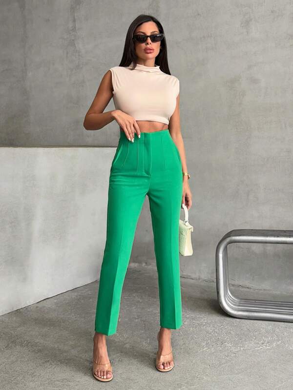 RueChic Pantaloni verzi cu buzunare decorative