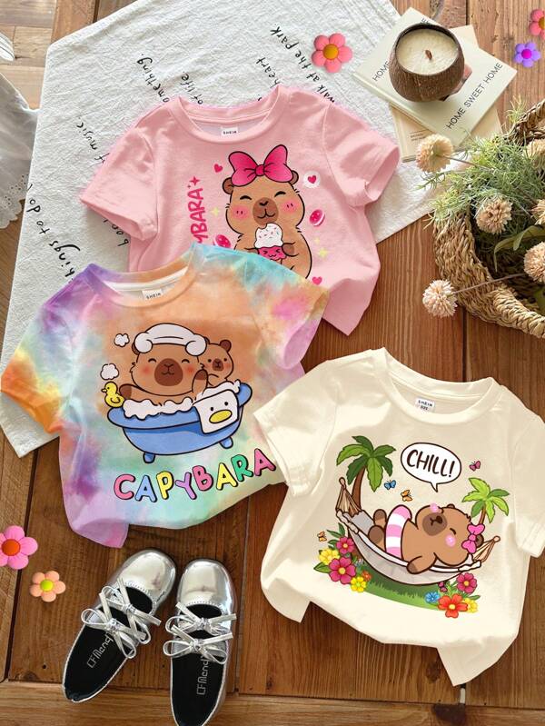 SHEIN Set de 3 camisetas de manga corta con cuello redondo para niña bebé con gráficos de Capibara en color crema blanco, crema rosa y colorido, de estilo casual y sencillo, adecuadas para primavera/verano, con diseño "Chill Chill Summer Vacay"