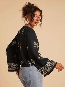 Travachic 深 V 领黑色梭织衬衫，喇叭袖，全身印花，女士波西米亚风上衣，前系带上衣，波西米亚风衬衫，前系带衬衫，适合度假、下午茶、婚礼季节、海滩邮轮度假、城市公路旅行度假、波西米亚风度假、音乐节、沙滩装、复活节、海滩，优雅女士上衣 - 黑色 - 查看 2