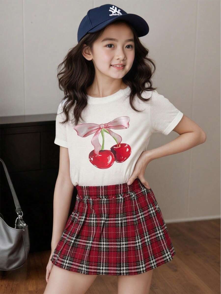 SHEIN 2pcs/Set Young Girl Cherry Pattern Round Neck T-Shirt + Woven A-Line Skirt With Leggings Safety Shorts Suit - Red - View 1