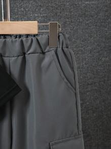 SHEIN 2pcs Tween Boy Set: Letter Print Short Sleeve T-Shirt And Solid Color Pocket Long Pants