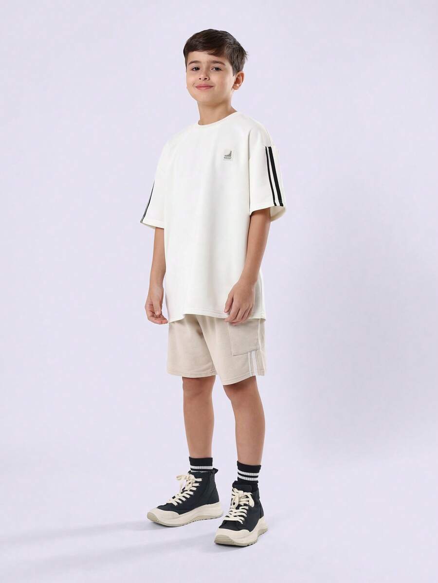 SUMWON Conjunto de camiseta oversize y pantalones cortos con detalles a rayas para jóvenes, atuendo de streetwear de verano cómodo y transpirable - Multicolor - Ver 1