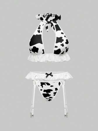 Conjunto de lencería sexy que incluye bralette de halter con estampado de vaca, tanga tipo g-string y liguero de encaje