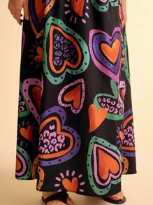 CAJUNI Falda larga estampada con corazones de colores, estilo bohemio, para vacaciones, casual, playa, verano, para mujer tallas grandes, color negro