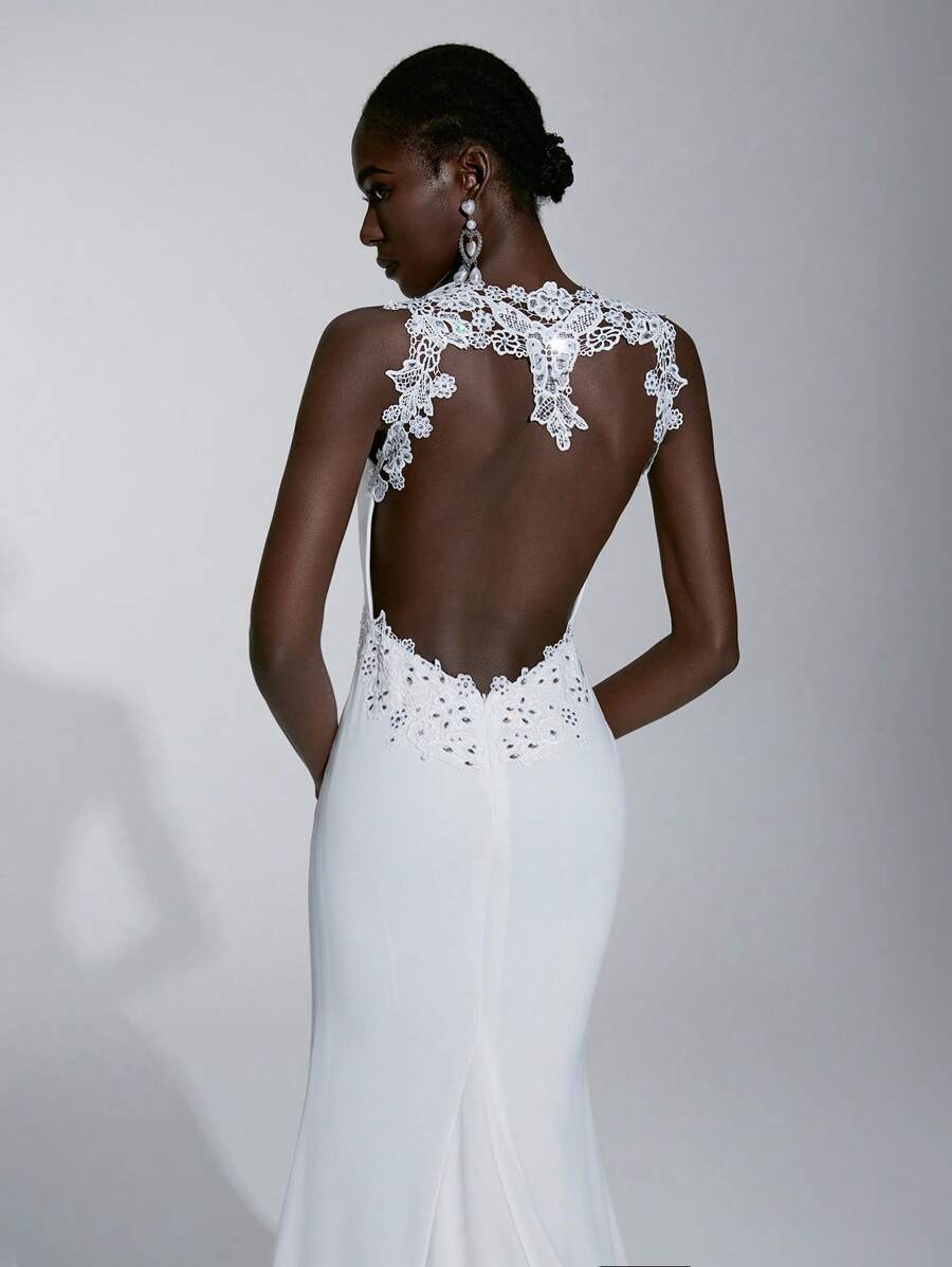 Elitara 无袖纯色美人鱼露背优雅蕾丝刺绣婚纱