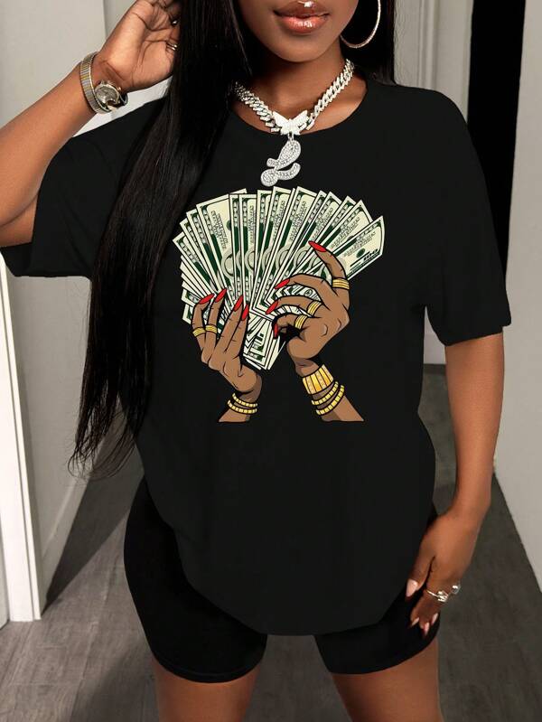 VaVaBold T-shirt oversize à épaules tombantes pour femmes, avec design simple et imprimé du symbole du dollar américain. Hauts graphiques pour femmes