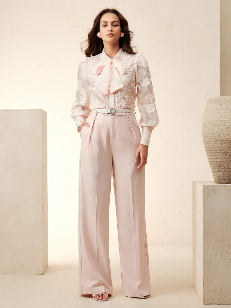 Camisa de manga larga con cuello de lazo de tela jacquard elegante