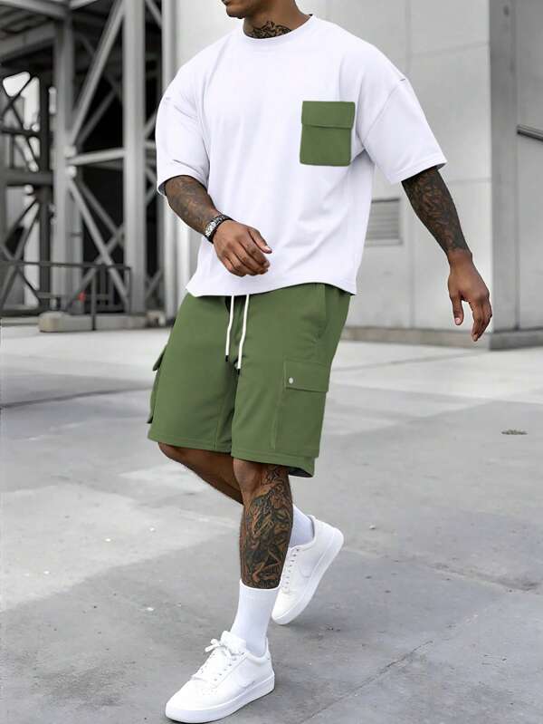 Manfinity LEGND Conjunto informal de camiseta y pantalones cortos con bolsillo y contraste de color para hombres, verano