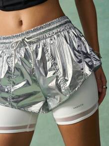 VARSITIE Women's Shiny Silver Athletic Skort Featuring Contrasting White Inner Shorts. These Short Activewear Bottoms Come With A Pocket And Knit Fabric For High Elasticity And Comfortable Movement.