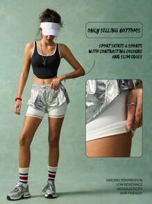 VARSITIE Women's Shiny Silver Athletic Skort Featuring Contrasting White Inner Shorts. These Short Activewear Bottoms Come With A Pocket And Knit Fabric For High Elasticity And Comfortable Movement.