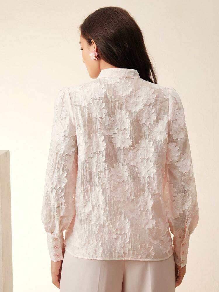Camisa de manga larga con cuello de lazo de tela jacquard elegante