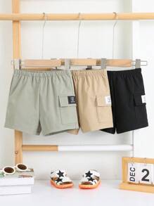 Set de 3 pantalones cortos de verano casuales y versátiles para bebé niño/niña, de unicolor, con bolsillo con letra, cintura elástica y multipaquete a juego - Multicolor - Ver 7