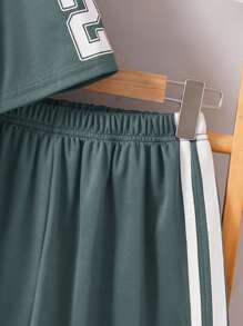 SHEIN Conjunto de 2 piezas de camiseta de manga corta oversize y shorts deportivos para niños preadolescentes