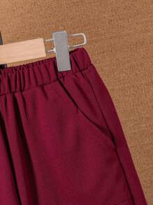 SHEIN Conjunto de ropa casual de verano para niños preadolescentes que incluye una camiseta de manga corta con bloques de color y ribetes contrastantes, y shorts con bolsillos