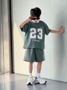 SHEIN Conjunto de 2 piezas de camiseta de manga corta oversize y shorts deportivos para niños preadolescentes
