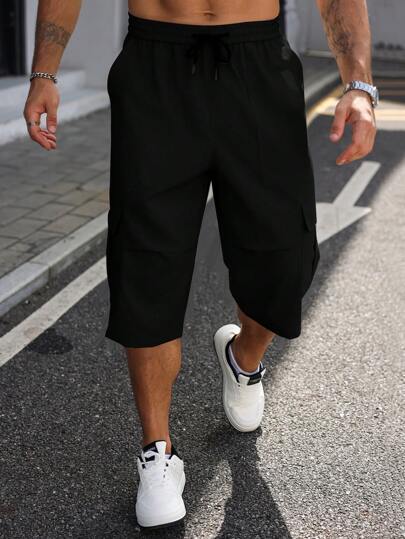 Manfinity Homme Plus Size Men's Elastic Waist Drawstring Loose Casual Summer Capri Pants Men Cargo Shorts Men Capri Shorts Men Jogger Shorts