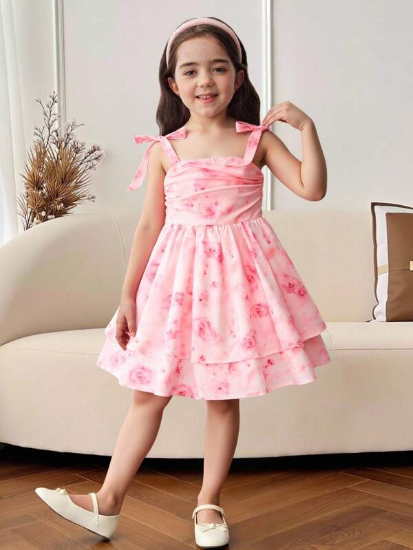 Young Girl Cute And Elegant Pink Strap Bowknot Dress With Pleated A-Line Layered Ruffled Ditsy Floral Mesh, Suitable For Outings, Gatherings, Spring/Summer, Vacation, Holidays Girls Pink Floral Dress Girls Summer Dress Girls Party Dress Girls Casual Dress Pink Dress For Girls