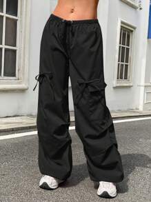 SHEIN Pantalones holgados informales de carga de estilo llamativo con bolsillos de cinta de contraste de color para niñas preadolescentes