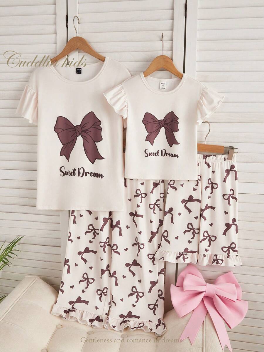 2 件套女童可爱蝴蝶结印花休闲圆领短袖上衣和荷叶边下摆 3/4 裤家居服套装