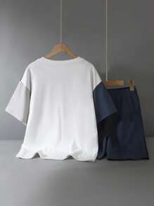 Set di 2 pezzi con maglietta girocollo multicolore in maglia, abbinata a pantaloncini, molto adatto per pendolarismo, andare a scuola, attività all'aperto ecc. come combinazione quotidiana.