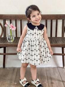 SHEIN LMoss Kids Vestido Império com Estampa de Borboleta e Gola Smocked para Meninas - Preto e Branco - Ver 2