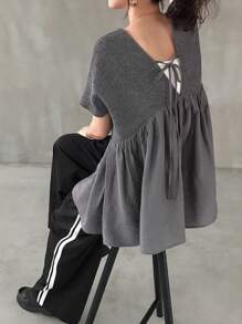 FRIFUL T-shirt ample et décontracté pour femmes, de couleur unie avec un patch au dos, nœud papillon et découpe. Idéal pour l'été.