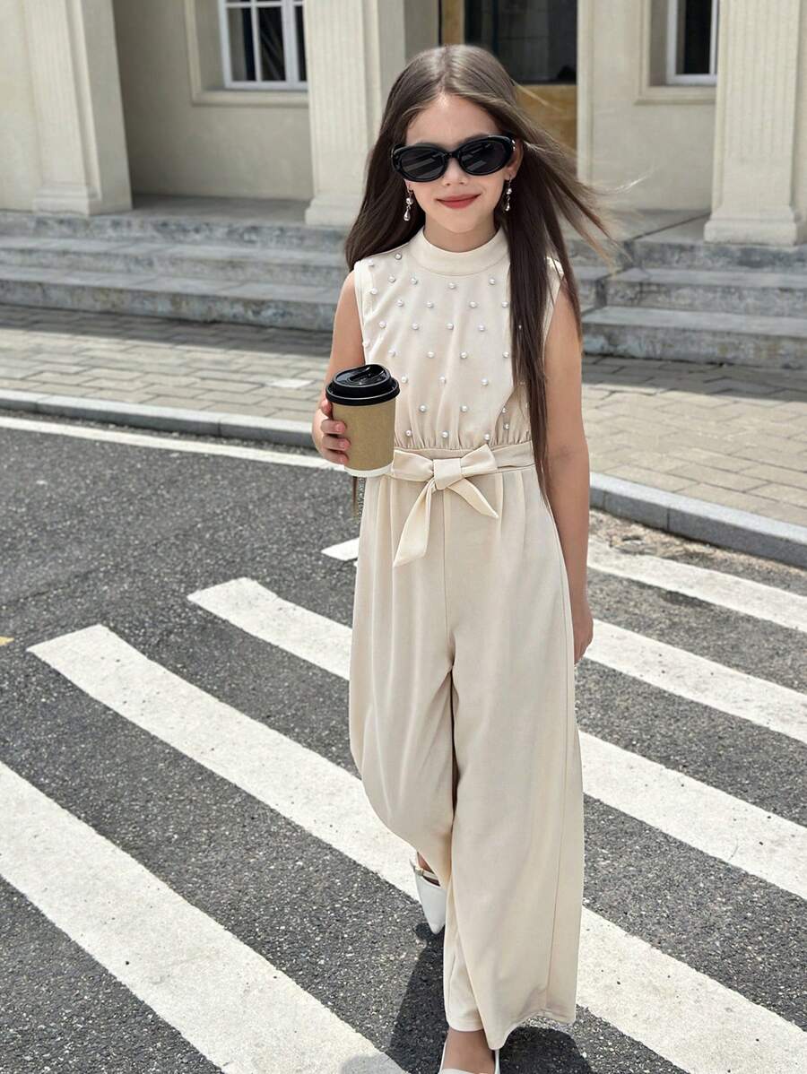 SHEIN Tween Girl Elenzga 珍珠串珠无袖束腰奶油黄色通勤叠领上衣阔腿连体裤，舒适连体裤，不对称无袖上衣连体裤，适合春夏秋冬季节，演唱会女童服装，优雅，晚礼服，适合日常通勤，婚礼季/音乐节 - 杏色 - 查看 1