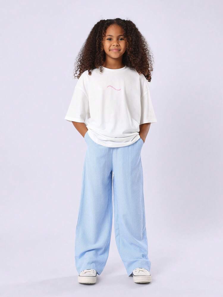 Set coordinato con t-shirt e stampa a onde, stelle marine e conchiglie