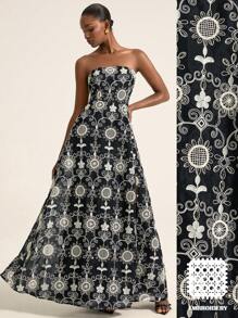 Aveloria Rosie Robe longue élégante d'été pour femmes avec fente, ajourée, broderie perlée. Robe maxi noire très évasée et sans bretelles pour vacances