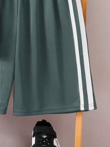 SHEIN Conjunto de 2 piezas de camiseta de manga corta oversize y shorts deportivos para niños preadolescentes