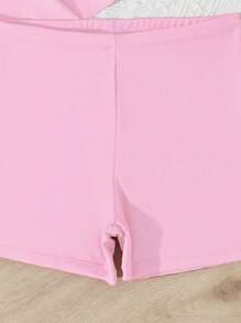 SHEIN 2 件青少年女孩单色拼接镂空分体泳衣套装，含中长肩带泳衣和泳裤