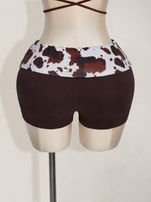 SHEIN ICON Shorts mini súper cortos con cintura plegable de talla grande con estampado de vaca, estilo bohemio nómada, apropiados para el verano