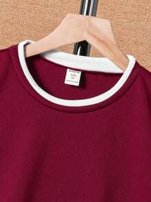 SHEIN Conjunto de ropa casual de verano para niños preadolescentes que incluye una camiseta de manga corta con bloques de color y ribetes contrastantes, y shorts con bolsillos