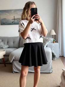 SHEIN Teen Girls Casual With Bow Decoration & Woven Solid Color Loose Round Neck Short Sleeve T-Shirt & Black Casual Skirt Set,Suitable For Everyday Wear