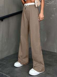 Pantaloni in cotone da donna con vita con cordoncino e bottoni frontali