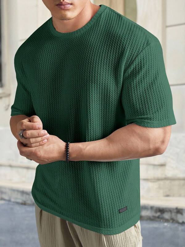 Manfinity BRENVOR T-shirt en mailles gaufrées unicolore ample pour hommes, pour l'été