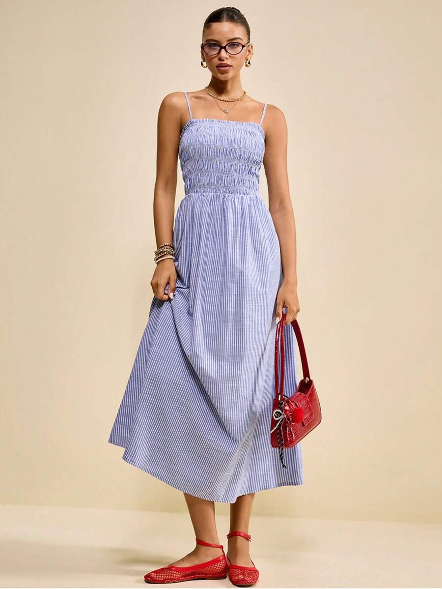 Muvela 2025秋冬新款女士条纹荷叶边休闲无袖中长连衣裙，设计风格涵盖休闲、学术、Y2K、乡村音乐节、复古、街头风、办公、约会、派对、外出、机场、返校等各种场合。 - 彩色 - 查看 1