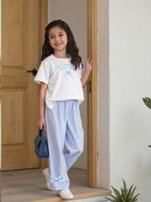 SHEIN Conjunto de 2 piezas de camiseta con estampado de oso de dibujos animados adorable y pantalones a cuadros para niña - Conjunto de ropa casual de verano