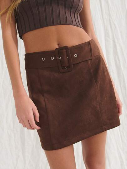 Nöista This Brown Skirt Is Made Of High-Quality Suede Fabric, Which Is Delicate, Soft And Textured. The High Waist And Wide Waistband Design Are Matched With A Wide Cloth Belt And Metal Eyelets In The Same Color To Emphasize The Waistline. The Skirt Is Simple Straight Cut With Neat Lines, And The Overall Shape Has Both Retro And Modern Feel.