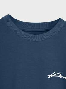 RueChic Set de 2 piezas de camiseta casual de manga corta con cuello redondo y estampado de letras, y shorts con cordón en la cintura para hombres