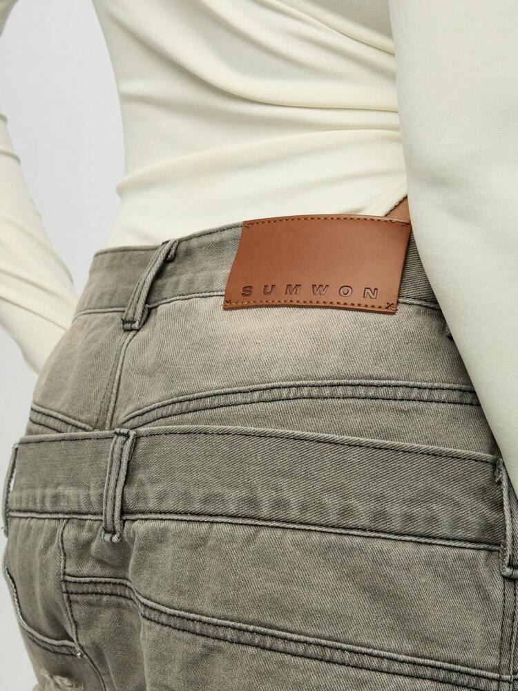 SUMWON WOMEN Minigonna in denim destrutturata a vita alta con orlo grezzo invecchiato e doppia cintura
