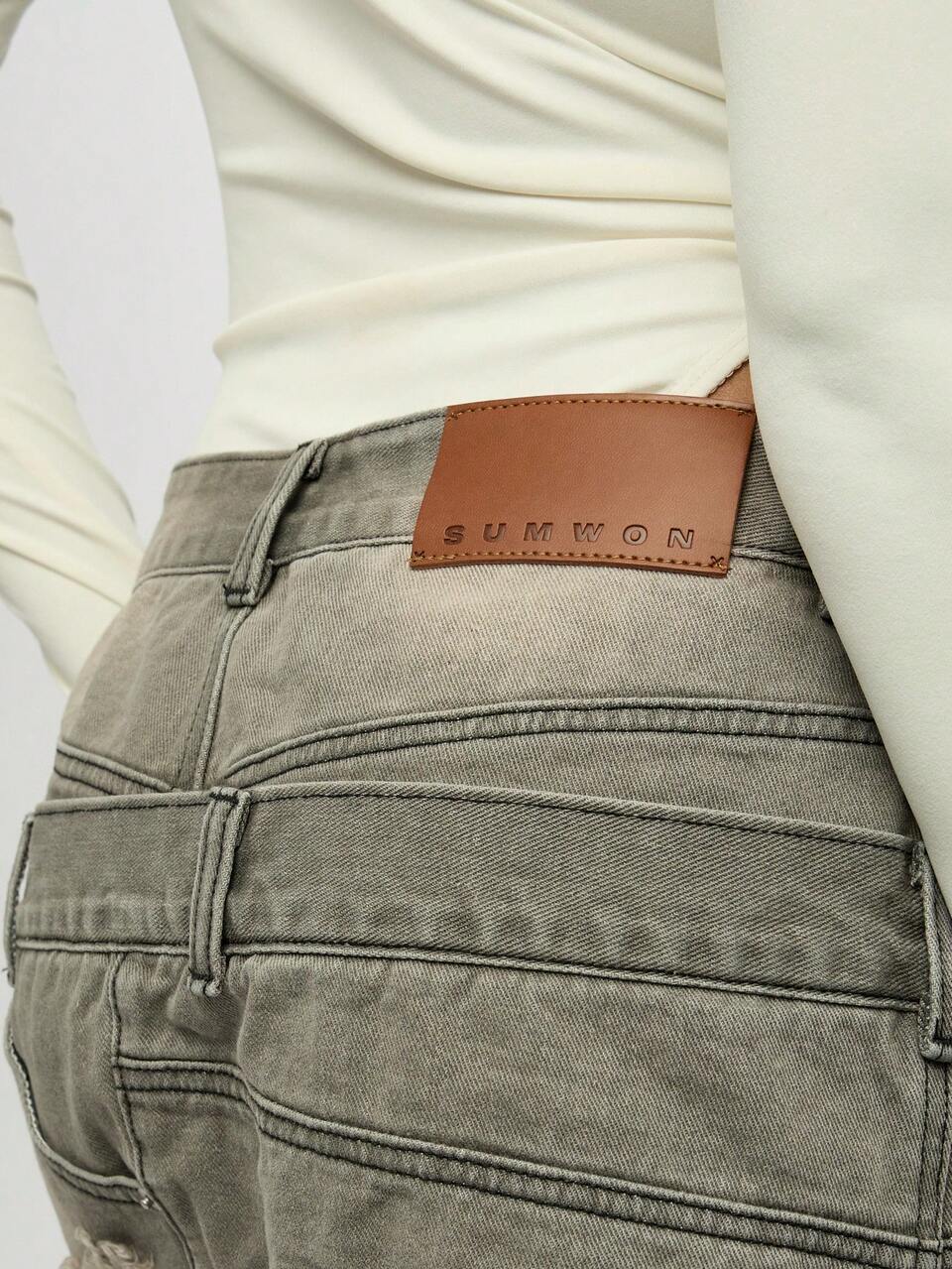 SUMWON WOMEN High Waisted Deconstructed Denim Mini Skirt With Distressed Raw Hem Double Waistband