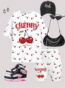 SHEIN Conjunto de 2 piezas vintage con camiseta de manga corta holgada y pantalones cortos con estampado minimista de cerezas, ideal para adolescentes en verano o viaje de primavera